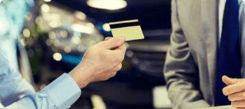 Person handing over card